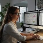 SEO proffessional working in a home office on a eliminating render-blocking JavaScript and CSS on WordPress